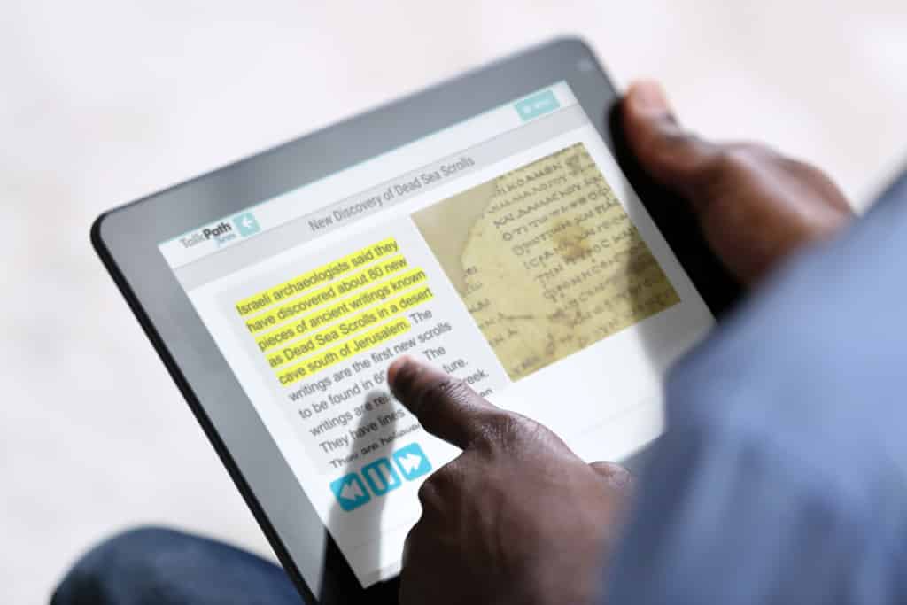 Close-Up-of-Man-Using-TalkPath-News-No-Logo